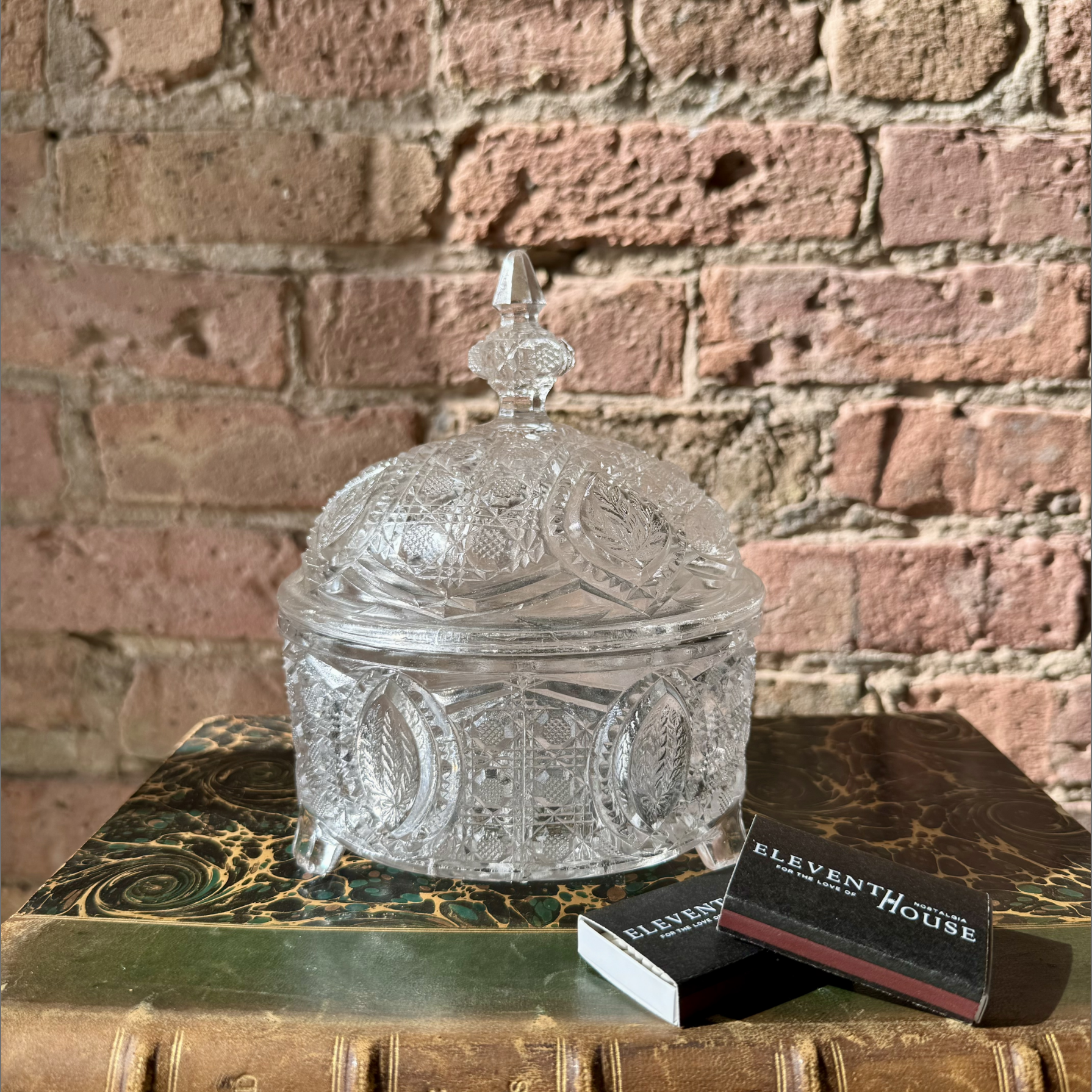 Eleventh House antique glass candle vessel with matchsticks