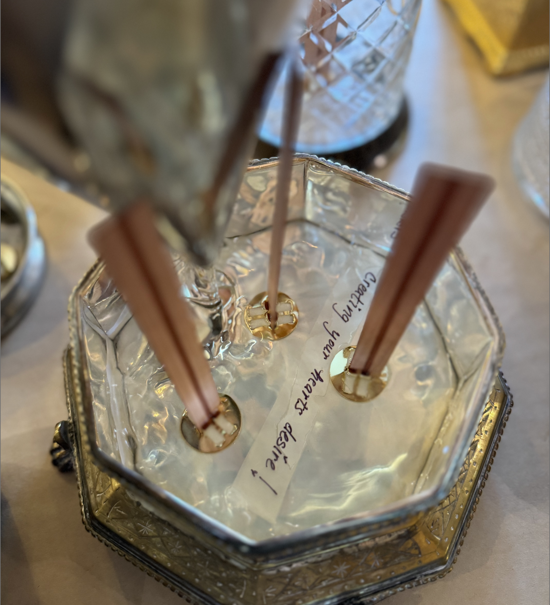 Eleventh House antique candle vessel being filled with non-toxic wax