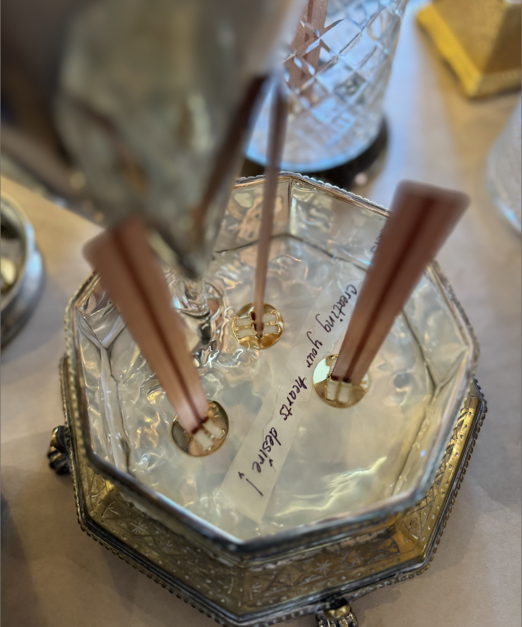Eleventh House antique candle vessel being filled with non-toxic wax